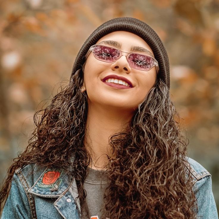 Avery Lin, Lead Design Curator at WindyFieldLab, reviewing corporate floral arrangements
